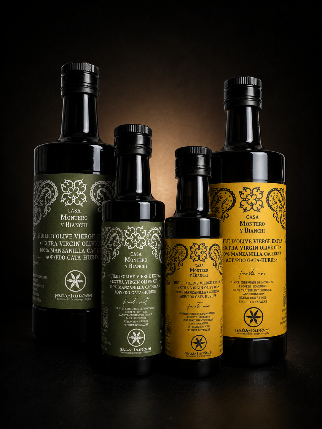 Gamme d'huiles d'olive vierge extra Casa Montero y Bianchi en formats 250 ml et 500 ml : fruité vert et fruité mûr, AOP Gata-Hurdes, 100 % Manzanilla Cacereña.