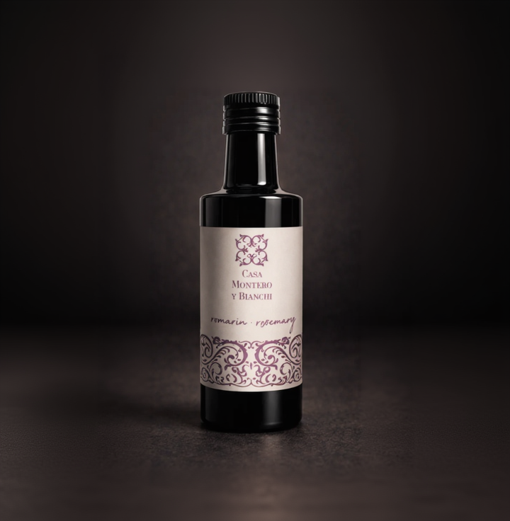Bouteille d'huile d'olive vierge extra aromatisée au romarin de Casa Montero y Bianchi.